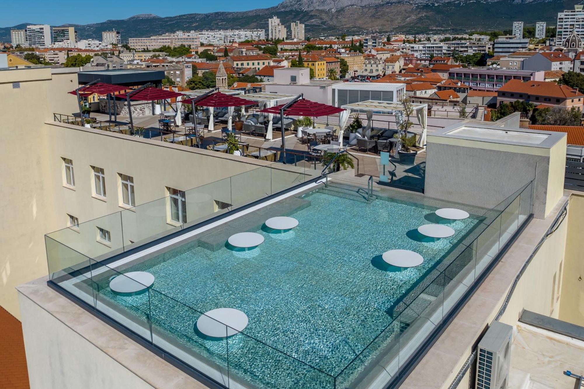 Cornaro Hotel Split Exterior photo Rooftop pool at the hotel